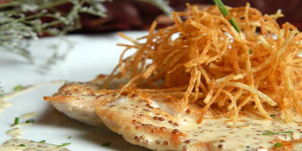 Filetes de pechuga de pavo con salsa de mostaza