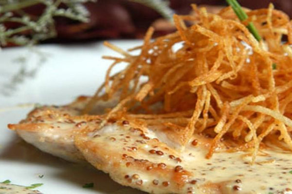 Filetes de pechuga de pavo con salsa de mostaza